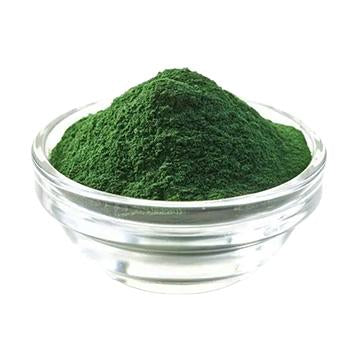 Chlorophyllin powder in a glass bowl